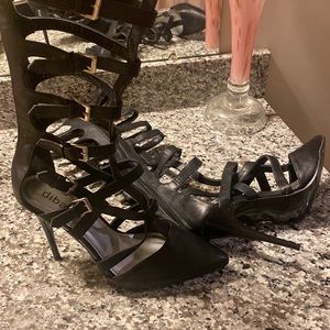 Black high calf caged stiletto heels